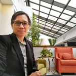 Kristine Delos Santos Neumann headshot